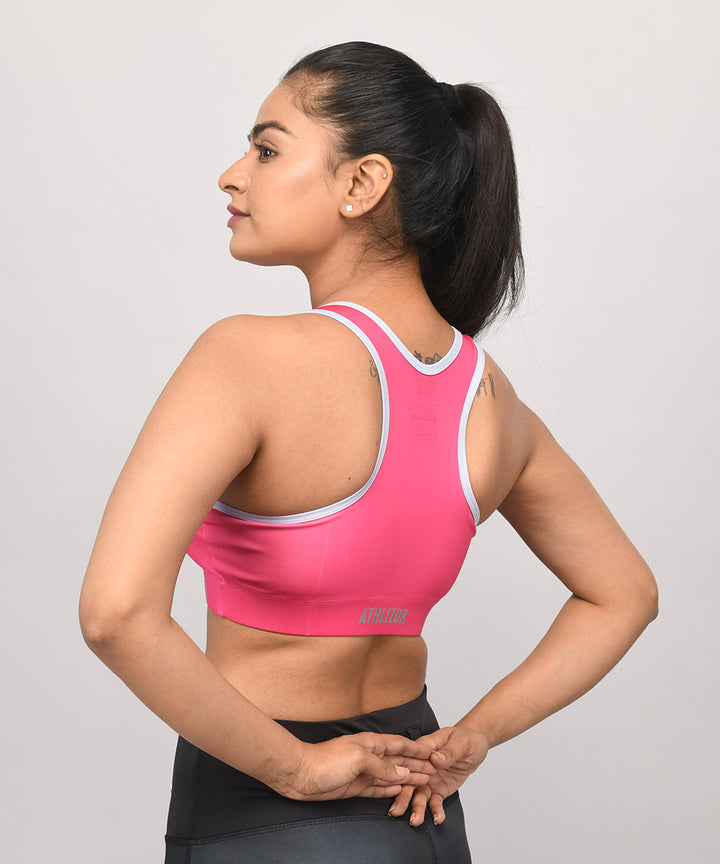 Buy Pink Racerback Sports bra for girls and women online. Buy padded sports bras online at Athlizur