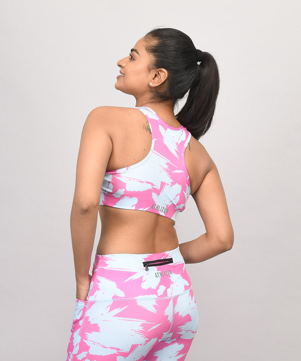 Buy racerback sports bra for workouts online in India. Shop printed Pastel Power Sports Bra at Athlizur. Buy workout bras for women and girls with removable pads